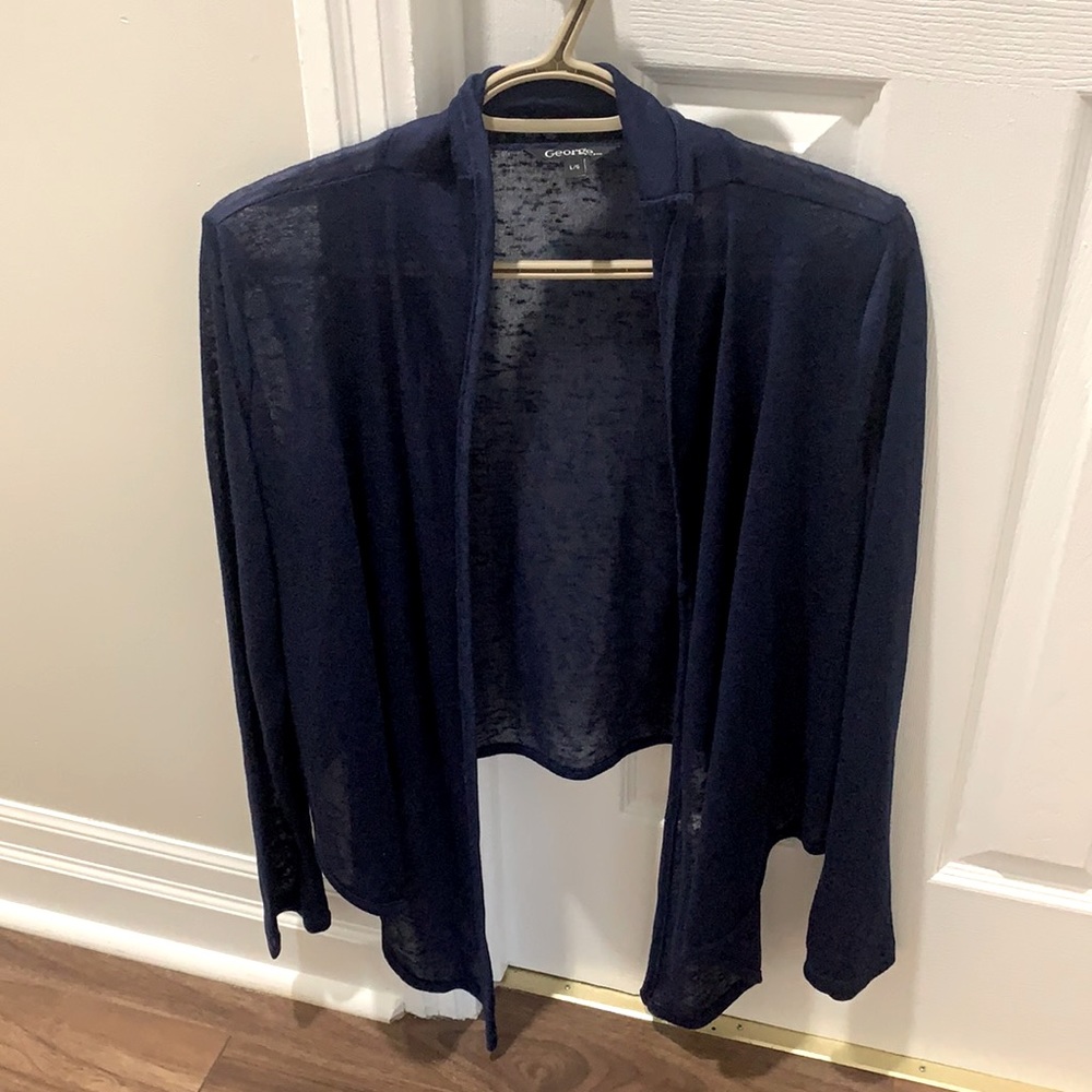 Woman’s thin cardigan.  From George. Size - Lareg